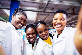 African Female Factory Workers taking a selfie during work break